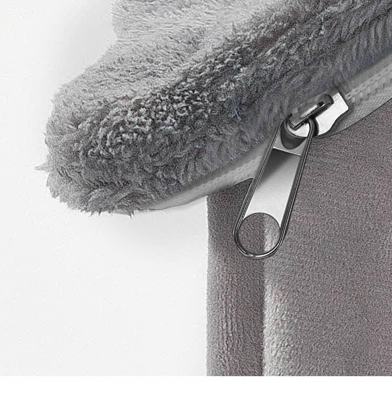 Matériau lavable sur un lit en forme de maison pour chien et chat