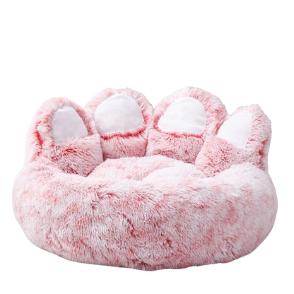 Coussin rose pour chien en forme de patte d'ours