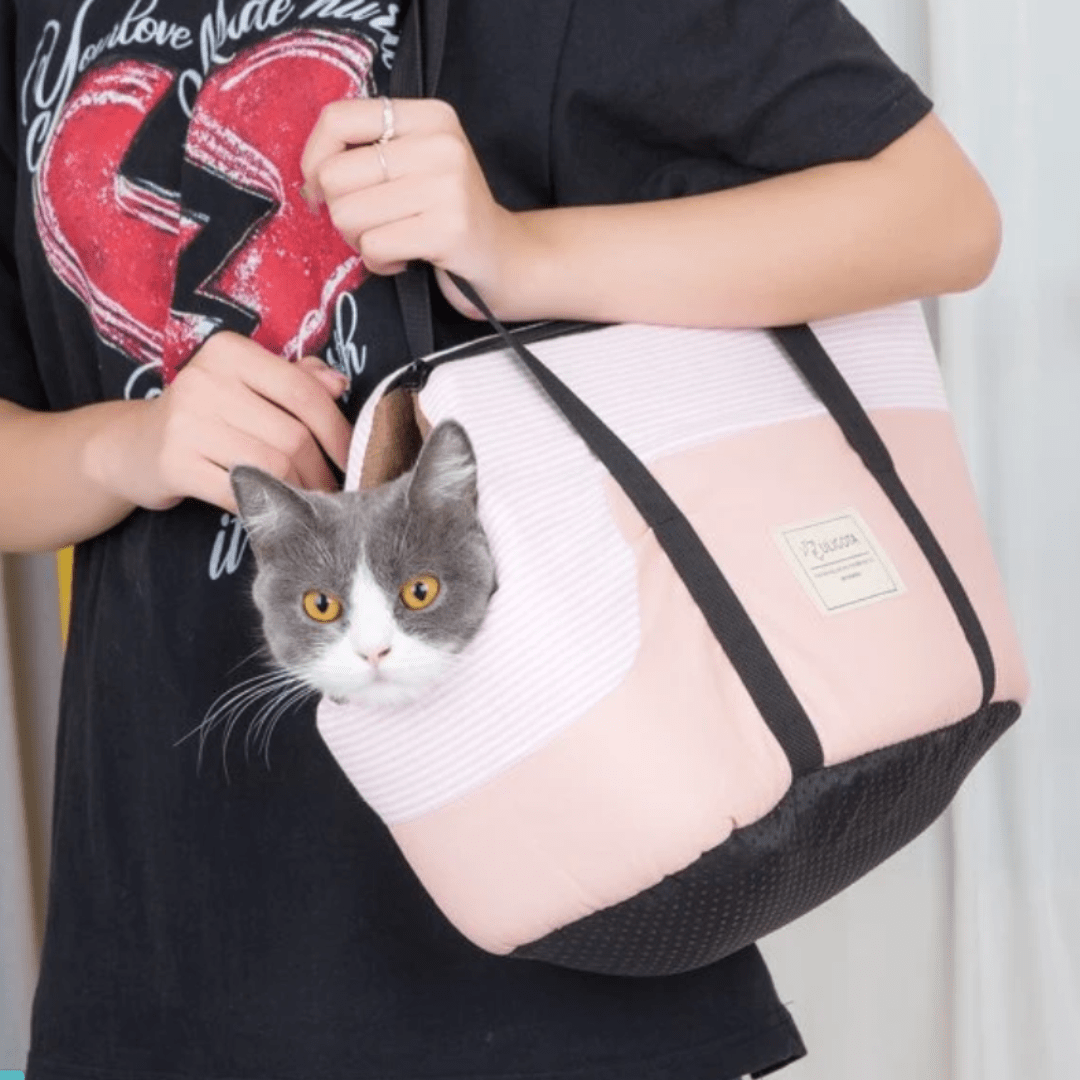 Chat dans notre sac d'épaule Gigote™ 
