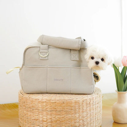 Chien dans notre sac de transport confortable