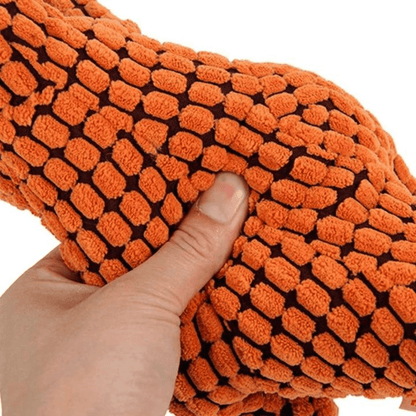 Peluche pour chien en forme de dinosaure orange