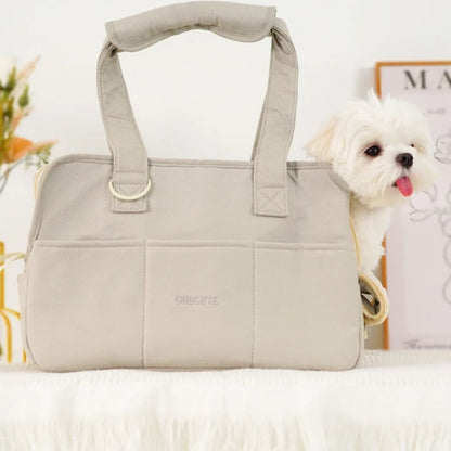 Chien dans notre sac de transport confortable