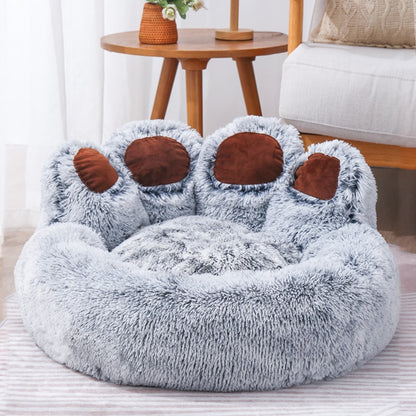 Coussin bleu pour chien en forme de patte d'ours